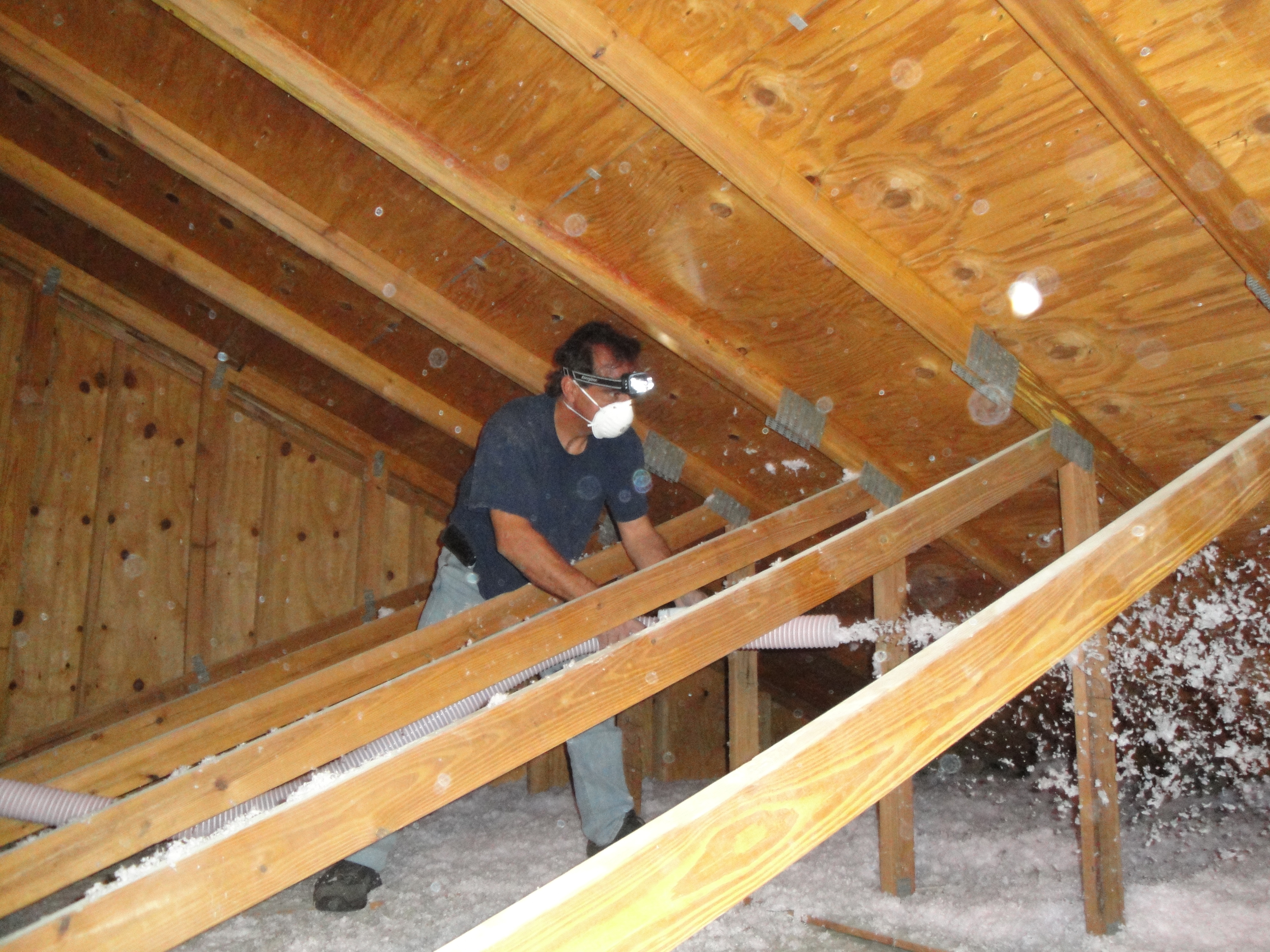 Attic insulation install by Jeff Handyman