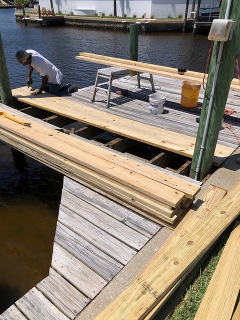 Boat dock rebuild in progress with new pressure-treated lumber by Jeff Handyman