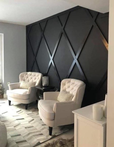 Custom diamond-paneled accent wall with formal seating area by Jeff Handyman