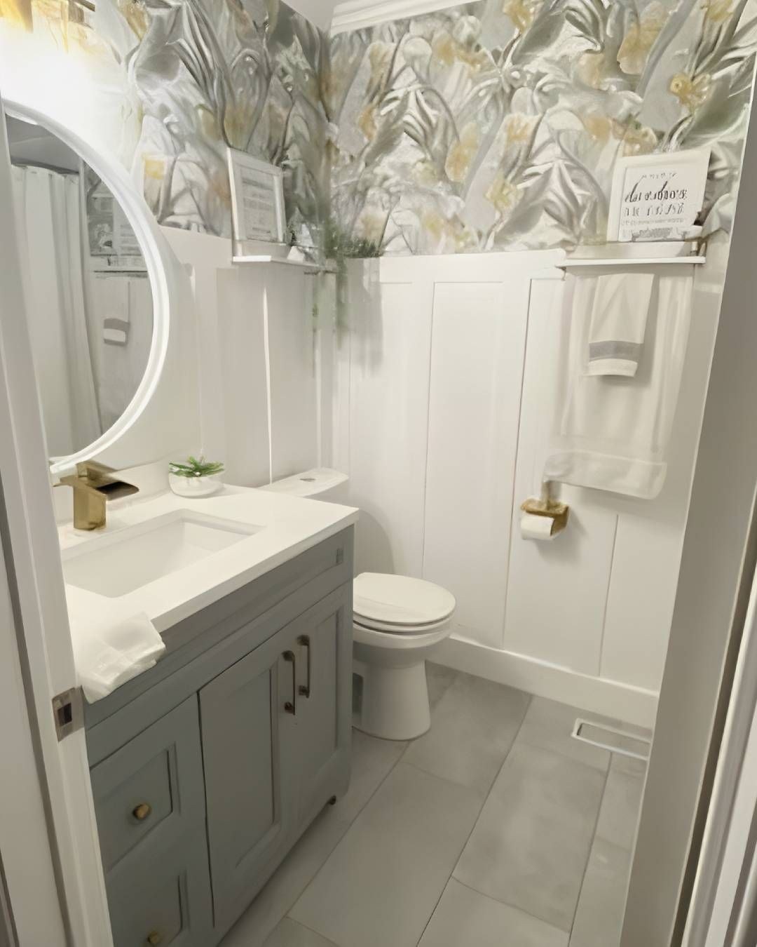 Botanical wallpaper paired with white batten board wainscoting in a bathroom by Jeff Handyman